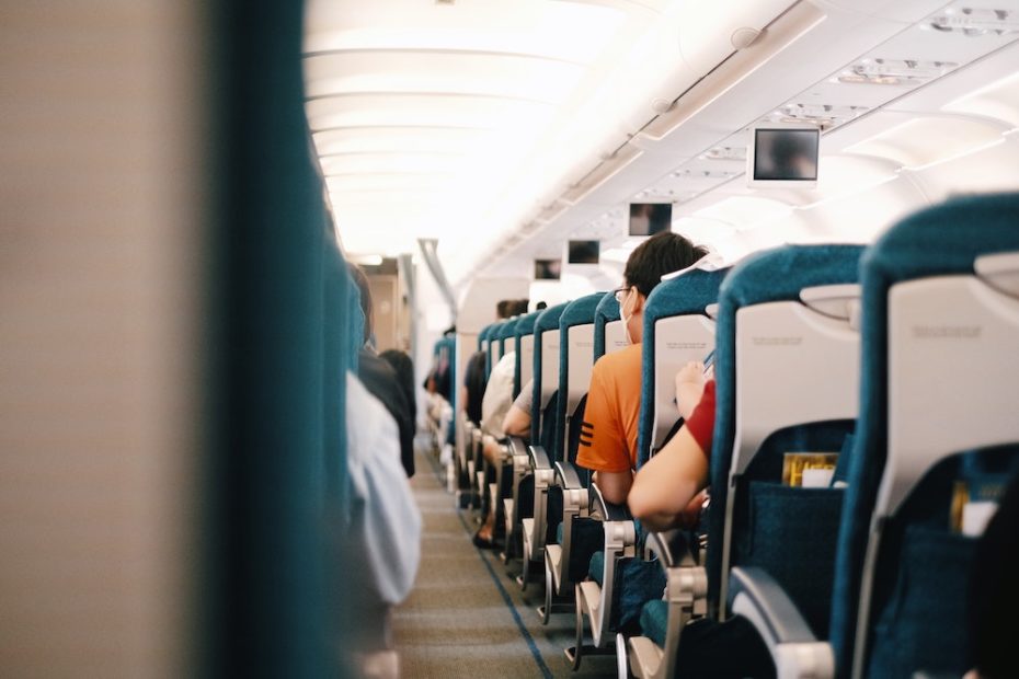People in economy class on a plane